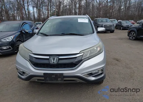 2016 Honda Cr-V Touring z USA, uszkodzony, nr VIN 5J6RM4H90GL067898